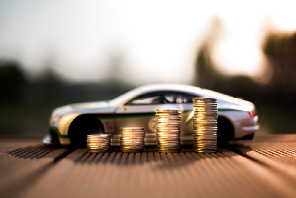 a toy car and coins